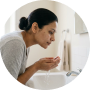 Splash face with water. Skin must be fully wet before applying  this activates Salicylic Acid and prevents over-concentration on dry skin.